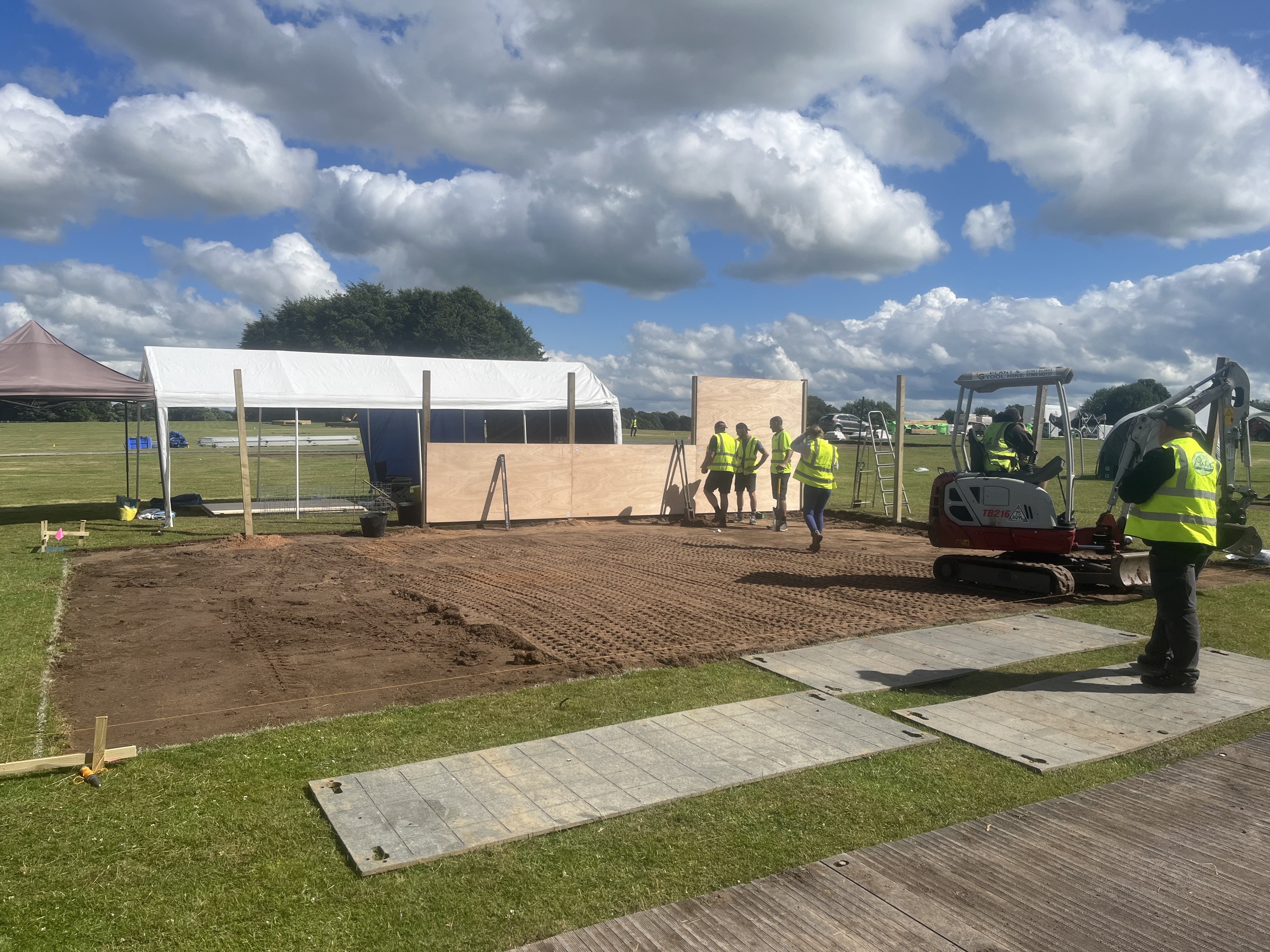 workers in high vis conducting ground work