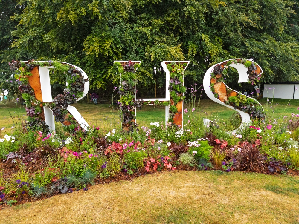 RHS initials covered in plants