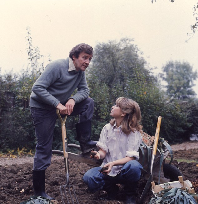 man and woman in allotment